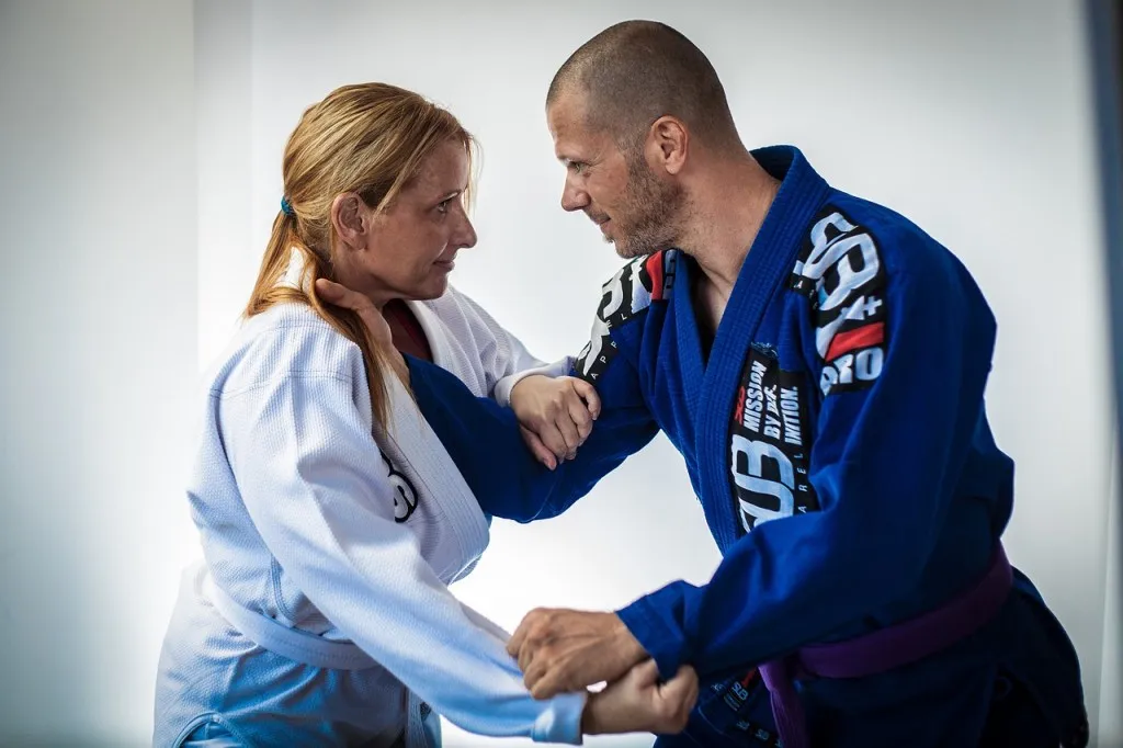 Two BJJ practitioners on the mat